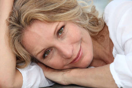 Woman lying downの写真素材