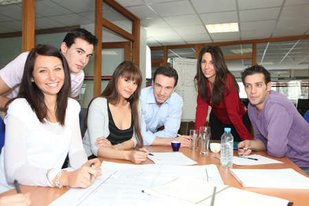 Team meeting in an office Team meeting in an office