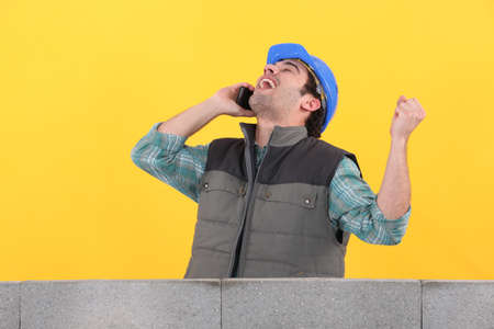 craftsman having good newsの写真素材