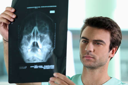 doctor watching X-rayの写真素材