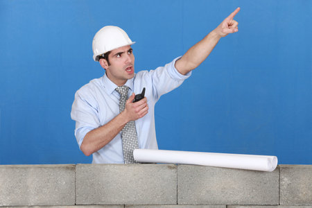 Foreman with a walkytalky