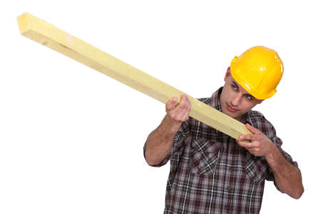 Worker with woodの写真素材