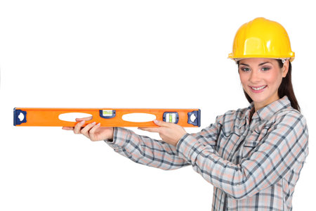 Tradeswoman holding a spirit level
