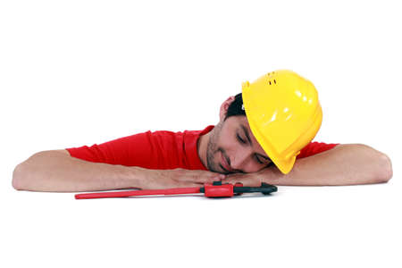 craftsman relaxing on a tableの写真素材