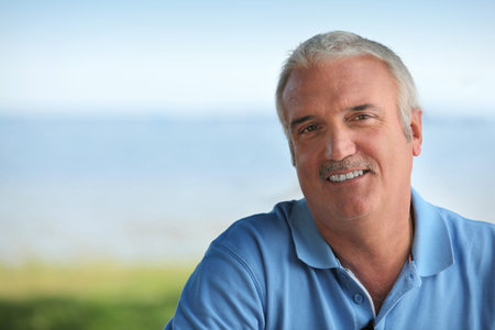 Man wearing blue polo