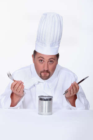 Cook with tin cansの写真素材