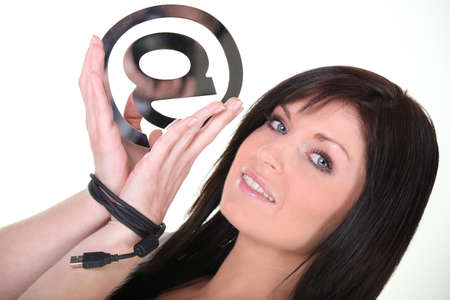 Woman holding an   signの写真素材