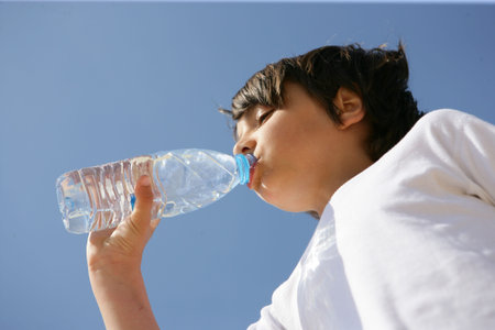 Drinking a bottle of refreshing water
