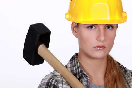 Woman with a sledgehammerの写真素材