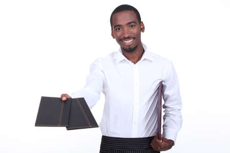 Waitor giving menusの写真素材