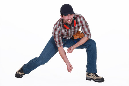 craftsman bending down
