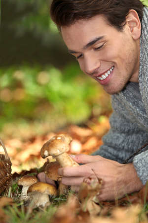 Man happy with mushroomの写真素材