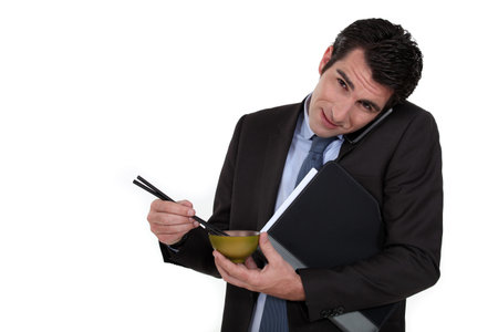 A quick lunch before the next meeting の写真素材