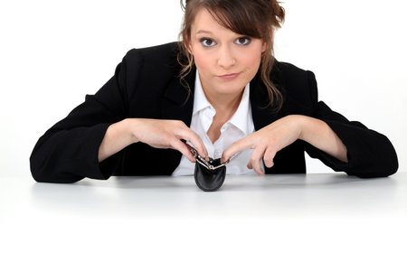 Office worker sat with empty purse