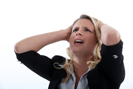 Horrified blond businesswoman