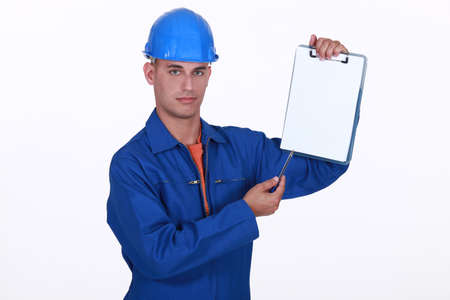 craftsman holding a notepadの写真素材