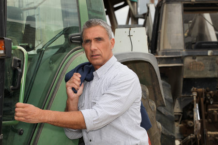 Man with tractorの写真素材