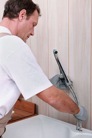 Plumber fitting new sinkの写真素材