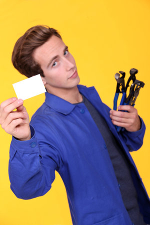 Handyman showing his business card