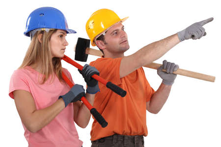 A team of labourers planning their day's workの写真素材