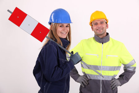 Man and woman construction workers