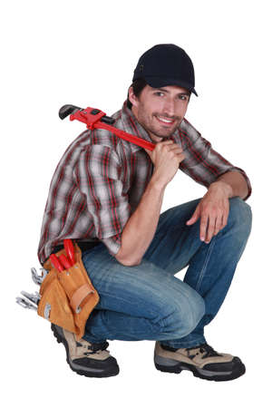 Handyman with a wrenchの写真素材