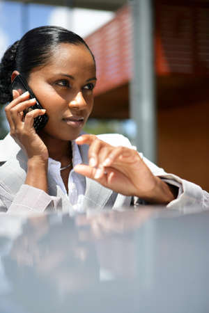 Businesswoman talking on her mobile phoneの写真素材