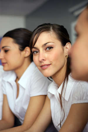 Three brunettes having business meetingの写真素材