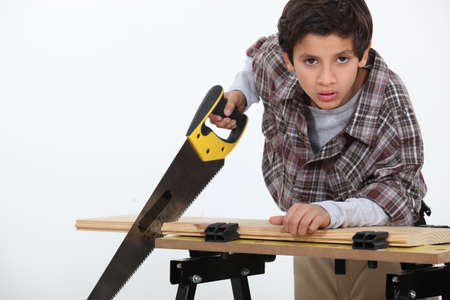 A little boy carpenter.の写真素材