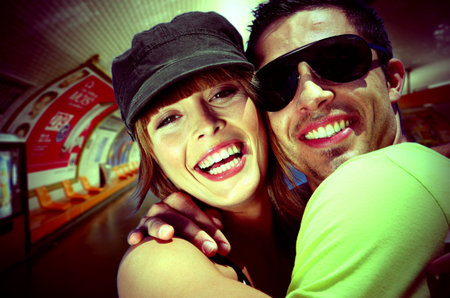 fashionable young couple in subway station