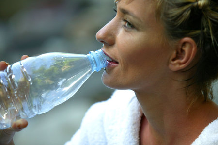 Woman with a bottle of water