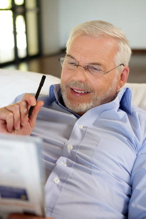 Man reading newspaper
