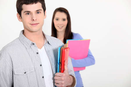 Teens with foldersの写真素材