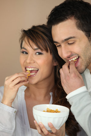 Couple eating cereal