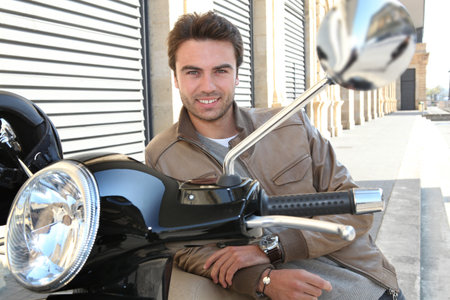 Urban man on a scooter