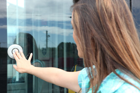 Women opening tram door