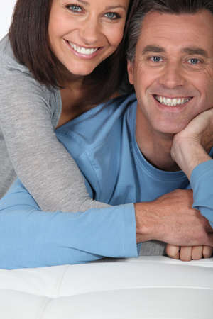 mature couple embracing mature couple embracing