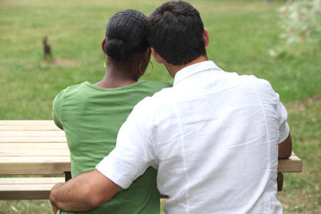 Couple on the field, back viewの写真素材