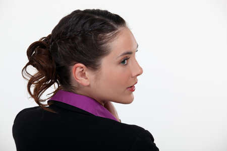 young businesswoman half turnedの写真素材