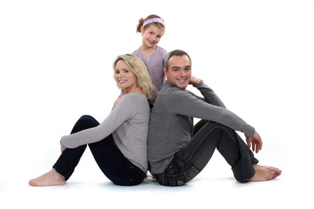 Parents and daughter on white background