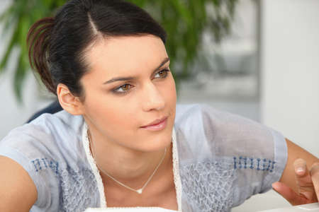 Young woman using a laptopの写真素材