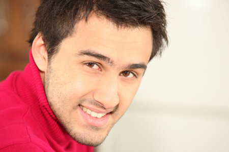 Portrait of young brown-haired man
