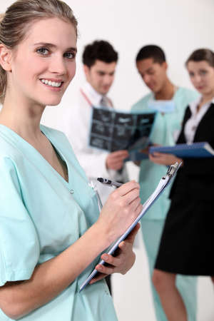 Medical team with a clipboardの写真素材