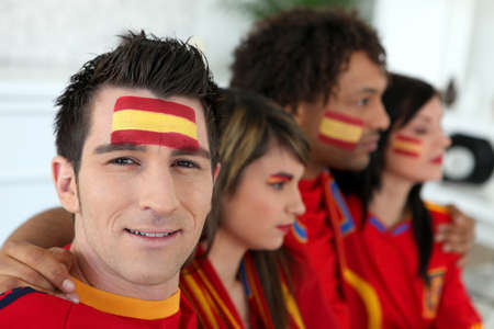 Two Spanish couples gathered to watch the footballの写真素材