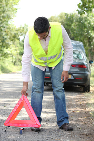 man with security triangle