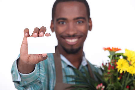 African florist with business cardの写真素材