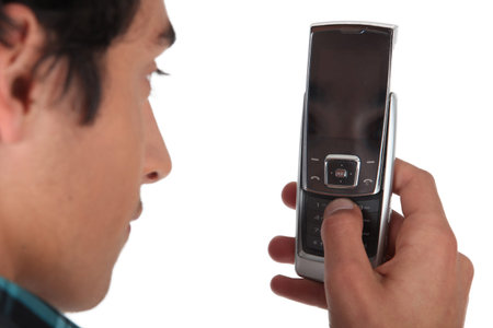 Young man using his mobile phone
