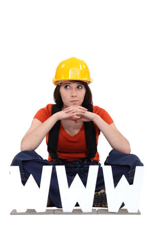Female builder with the letters WWWの写真素材