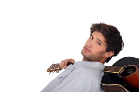 A man with an acoustic guitar 