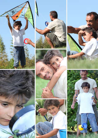 man and little boy playing with kiteの写真素材